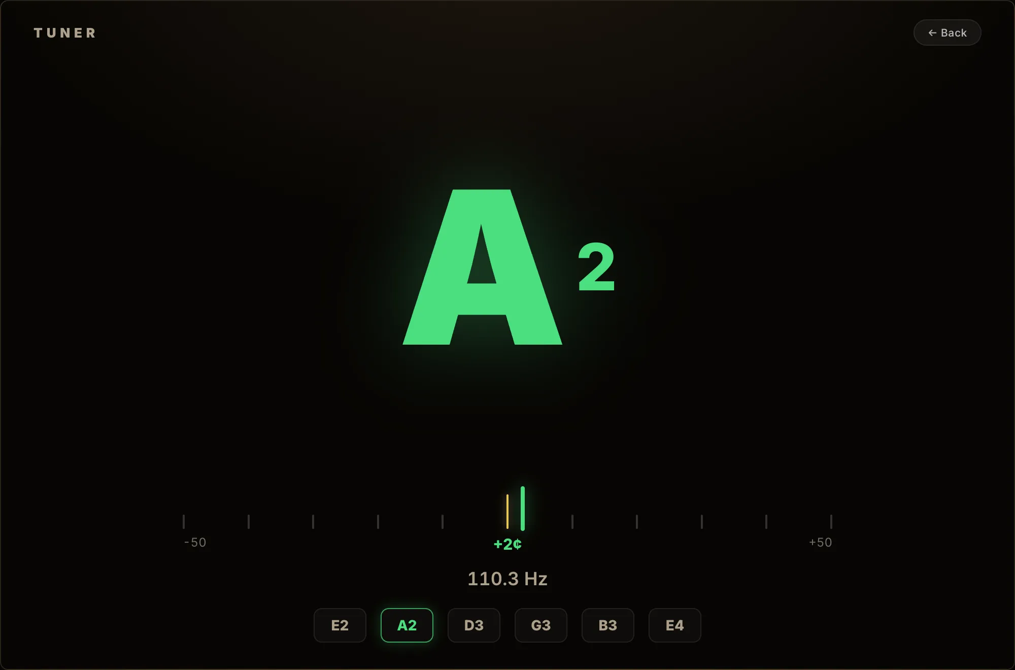 Magic Bronze full-page tuner: A2 in green, +2 cents deviation, with the six strings along the bottom.